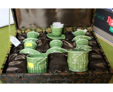 Boxed set of cups and saucers, sugar basin and jug 