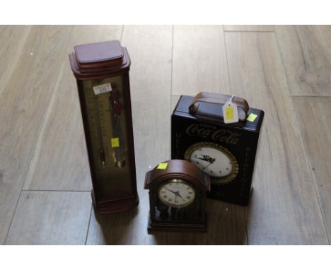 Storm and glass barometer, clock advertising Coca Cola and mantle clock 