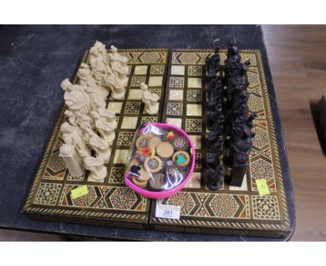 Folding backgammon box with pieces and combined chess set with Henry VIII pieces