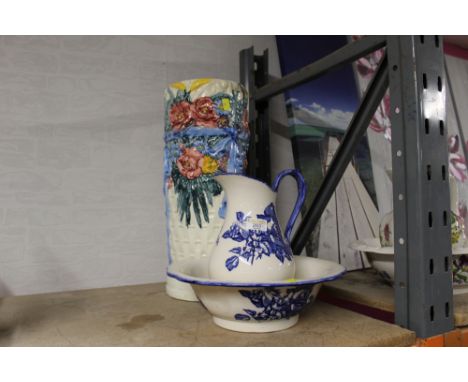 Blue and white jug and bowl and floral stick stand, height 48 cm