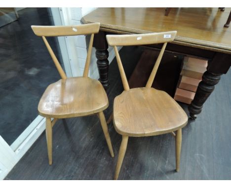 A pair of Ercol kitchen chairs