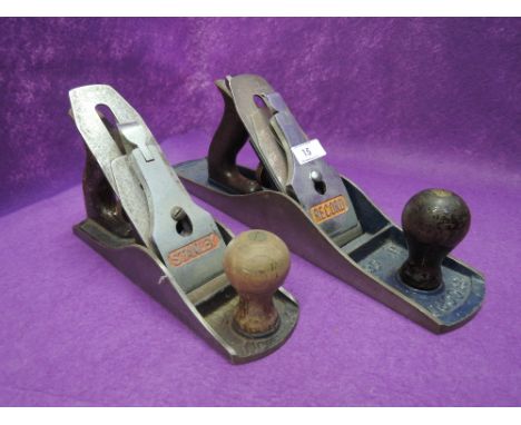 Two vintage wood working planes one Record no. 5 1/2 and a Stanley no. 4