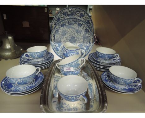 A part dinner service by Noritake in the Howo pattern blue and white, tea cups and saucers etc