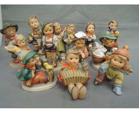 Twelve Hummel figures including Skating Lesson, Playmates, The lost Sheep etc, (some af)