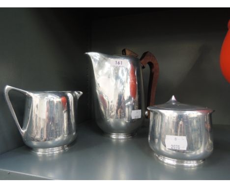 A vintage stainless steel tea set by Picquot ware