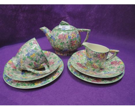 A vintage tea service by Wedgwood in a chintz pattern reg no. 547269 tea cups saucers etc