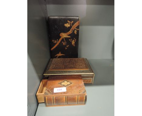 A selection of vintage treen trinket boxes including Eastern style carved and secret draw