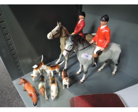 A Beswick style ceramic fox hunt figure set including hounds horse and hunters AF