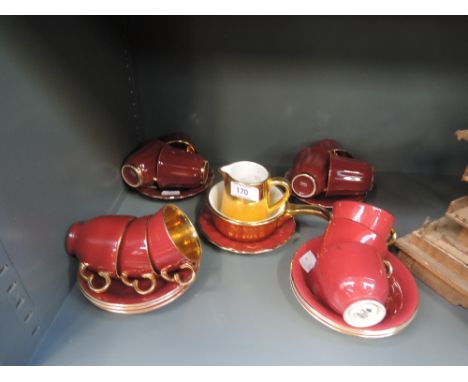 A set of small tea cups and saucers by Crown Devon