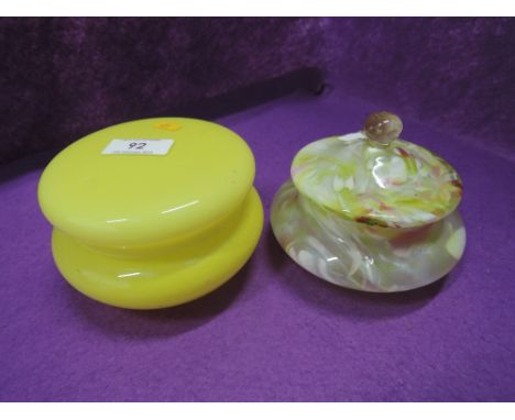 A selection of vintage glass containers including uranium and medina style 
