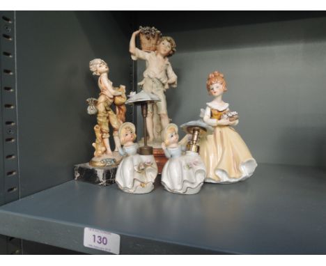 A selection of vintage ceramic figures and figurines some bisque style