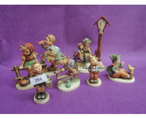 Seven Hummel figures including The Artist, Just Resting, Wayside Devotion etc (some af) 