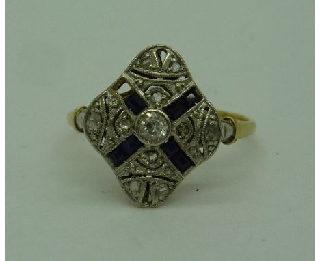 A yellow metal, diamond and sapphire Art Deco ring, lacking one sapphire, weight 2.5g, size N