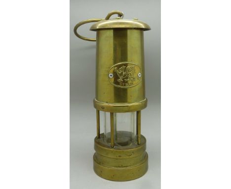 A miner's brass safety lamp