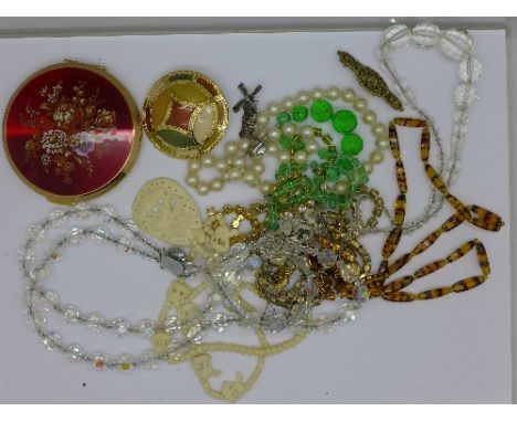 Vintage costume jewellery and a compact