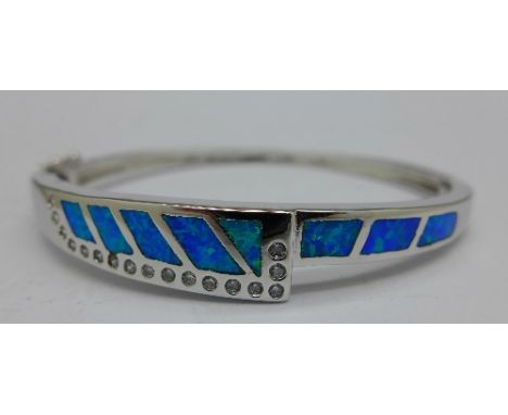 A silver set, Australian opal and white topaz bangle