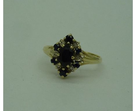 A 9ct gold, sapphire and diamond cluster ring, weight 1.8g, size M