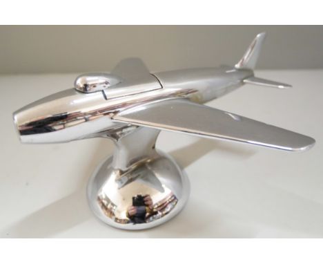 A novelty Dunhill chrome table lighter in the form of a jet plane 