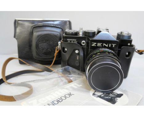 A 35mm Zenith camera with manual, (tested by vendor) and a Vanguard tripod
