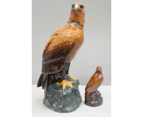 A Royal Doulton Whyte &amp; Mackey whisky decanter, Golden Eagle, and a Beswick Eagle, Beneagles scotch whisky, both with con