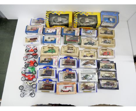 A box of die-cast model vehicles, Days Gone, Corgi, Shell, etc., boxed and loose motorcycles