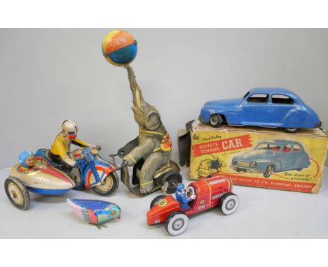 A Chad Valley remote control car and four tin plate toys 