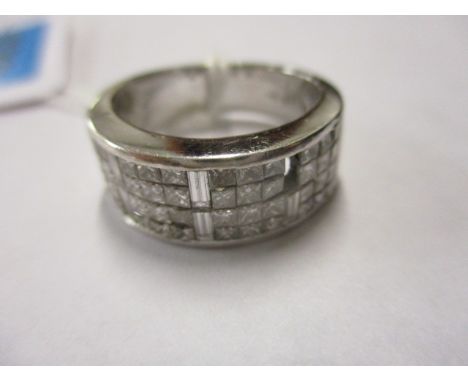 An 18ct white gold and diamond cluster ring