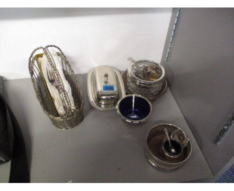 A small quantity of silver plate to include a silver napkin ring and a wine bottle holder