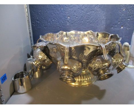 Silver plate to include a punch bowl, 12 dia, eight cups and a ladle and a three piece teaset