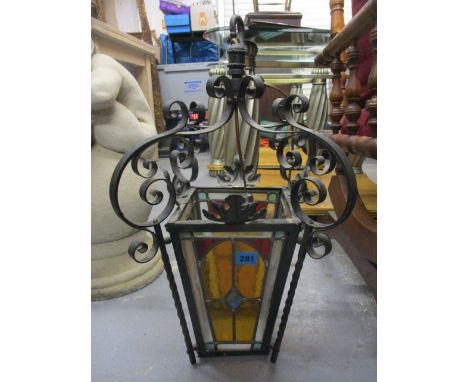 A 20th century, cast iron ceiling hanging light with coloured glass panels, 21 1/2 h