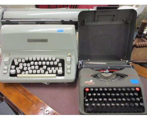 A mid 20th century Hermes Ambassador typewriter and an Empire Aristocrat typewriter