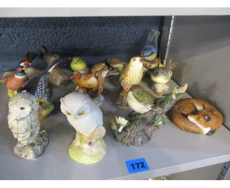 A collection model of birds to include Aynsley, Franklin Mint, Royal Worcester and others, together with an Aynsley Red Fox