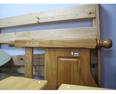 A Modern Pine Double Bed; together with a wrought iron standard lamp. (2)