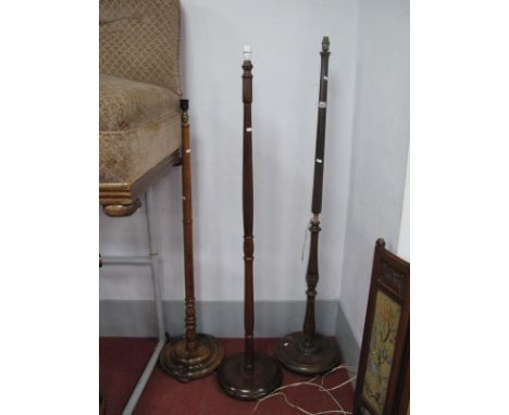 Three XX  Century Lamp Stands, on circular bases.