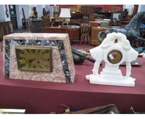 An Art Deco Eight Day Mantle Clock, in red veined marble angular case, 33cm wide. French mantle clock with the case featuring