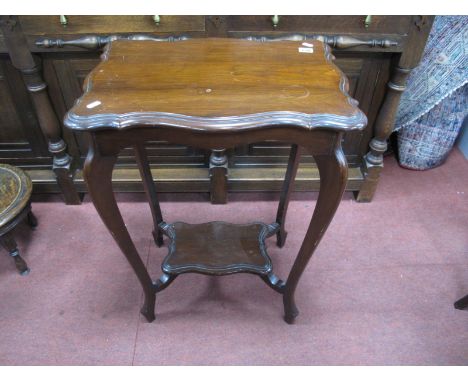 An Early XX Century Stained Mahogany Window Table, with a shaped top on cabriole legs with under shelf.