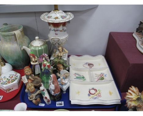 A Tuscan China Figure, 'Miss Holland Potted by Plant' No 135, Goebel figures, Poole dish etc:- One Tray.
