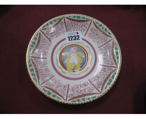 A Clarice Cliff Saucer, designed by Dame Laura Knight for the 'Artist in Industry' Collection, depicting a clown surrounded b