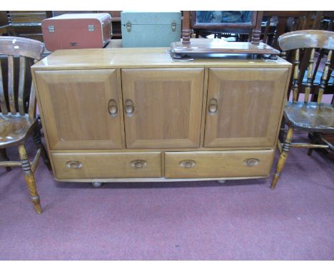 Ercol Ash Sideboard, three cupboard doors over two small drawers, 129cm wide x 76cm high.