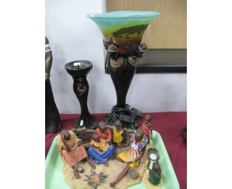 Soul Journeys Maasai Bearer of Flame Candlestick; similar lamp, 44cm high, Maasia 'Ngano' and two others. (5)