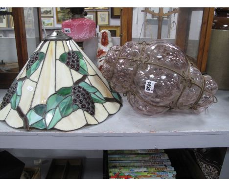 A Tiffany Style Lamp Shade, with bunches of grapes on mottled cream ground, a pale amethyst tinted glass ceiling light shade.