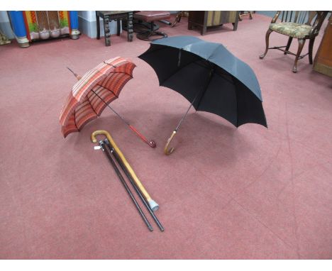 Two Silver Topped Walking Canes (marks rubbed); another walking stick, ladies umbrella. (5)