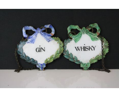 Pair of Enamel Spirit Bottle Labels marked ' Whisky ' and ' Gin ', each marked to verso Christian Dior, 7cm wide 