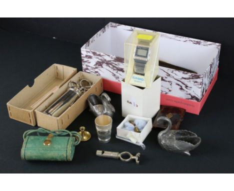 A box of mixed collectables to include a boxed Casio watch, faux tortoiseshell cheroot case and vesta case, stirrup cup, pewt