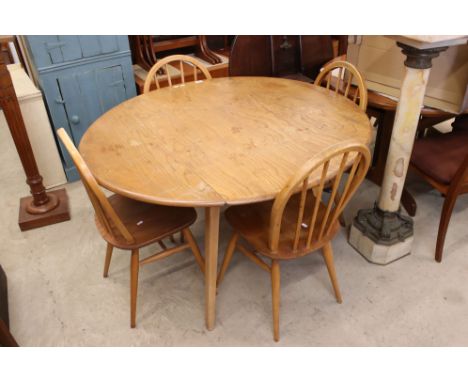Ercol Windsor Pale Elm and Beech Circular Drop Leaf Dining Table, model 384, 124cm long (when extended) x 113cm wide x 72cm h