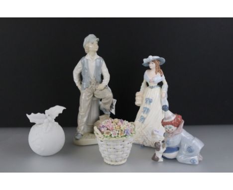 Five ceramic figures and ornaments to include a Lladro ' Pierrot With Puppy and Ball ' Nao Shoe Shine Boy, Nao christmas pudd