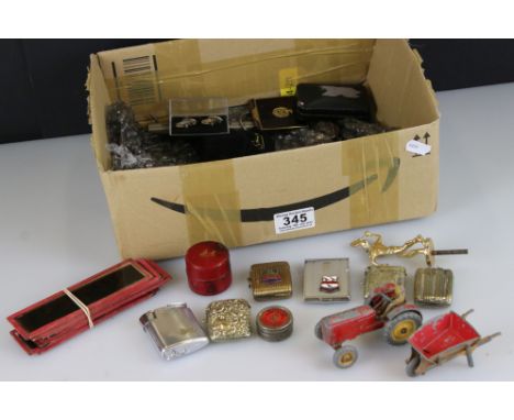 A box of mixed collectables to include lighters, vesta cases, glass magic lantern slides...etc.. 