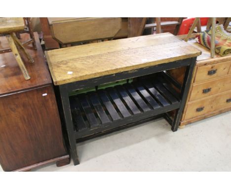 A vintage painted rustic pine work table with under shelf. 