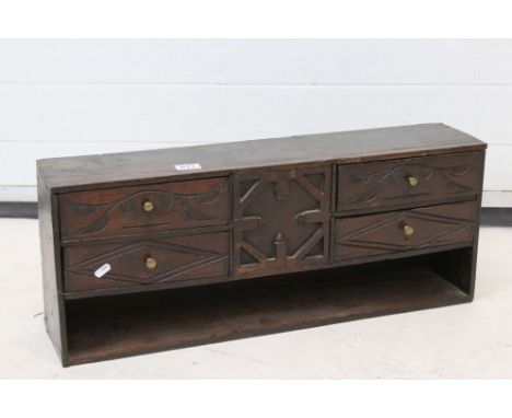 Antique Oak Wall Cabinet comprising central panel with moulded geometric design flanked either side by two drawers with carve