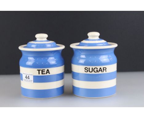 T G Green Cloverleaf Cornish ware Blue and White Striped Storage Jars and Lids, one marked Tea and the other Sugar, 18cm high